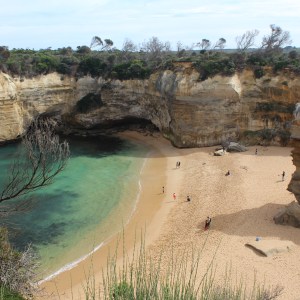 A beach in Melbourne, Australia on the Great Ocean Road with turquoise waters coming into the beach