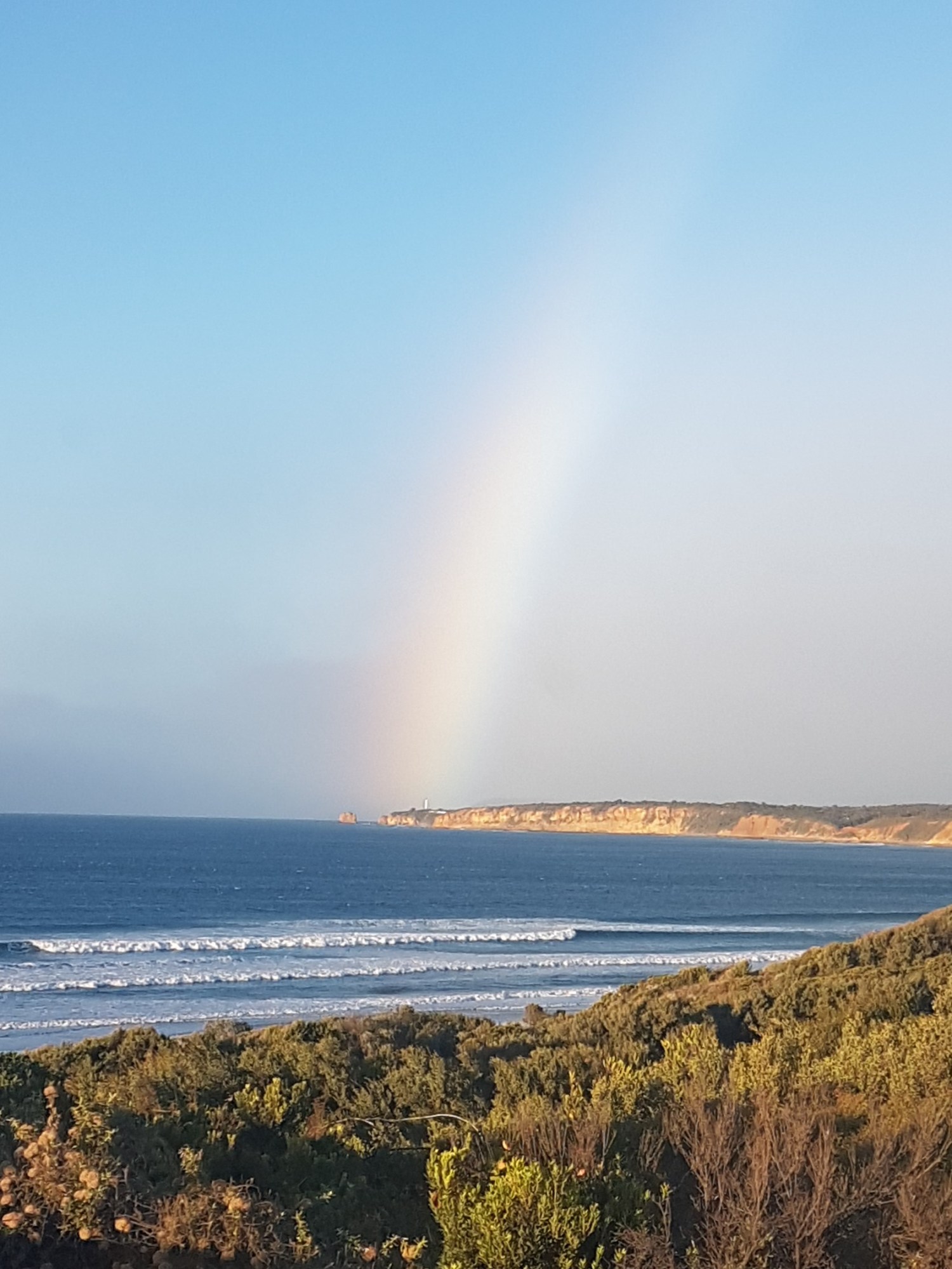 Rainbows always delight stnning Rainbow Pic near Split Point Lighthouse